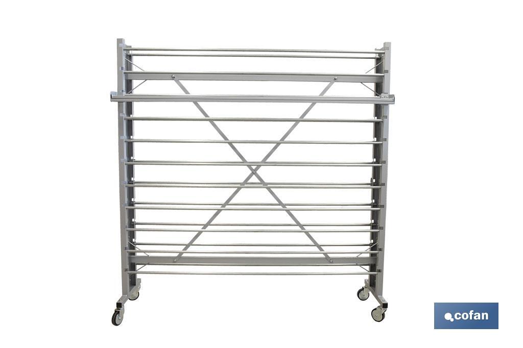 EXPOSITOR DE HULES Y MANTELES HORIZONTAL CON CORTADOR Y RUEDAS PARA 22 ROLLOS