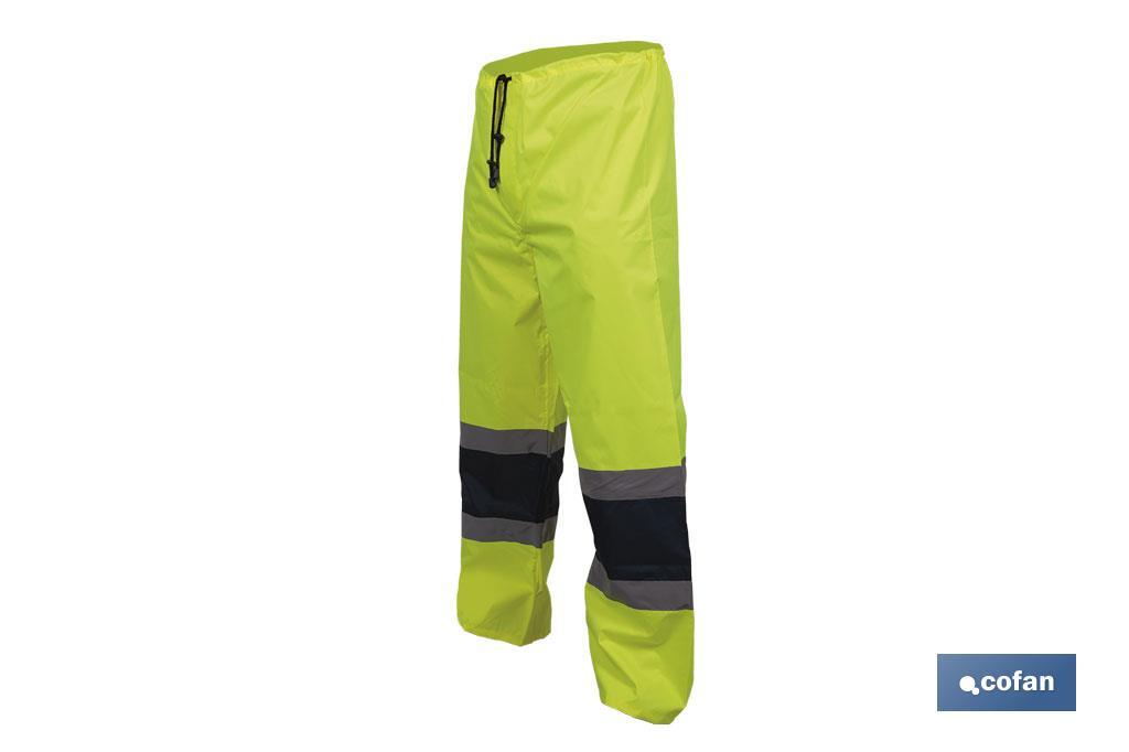 PANTALÓN DE LLUVIA DE ALTA VISIBILIDAD MODELO BELLATRIX AMARILLA Y AZUL TALLA M