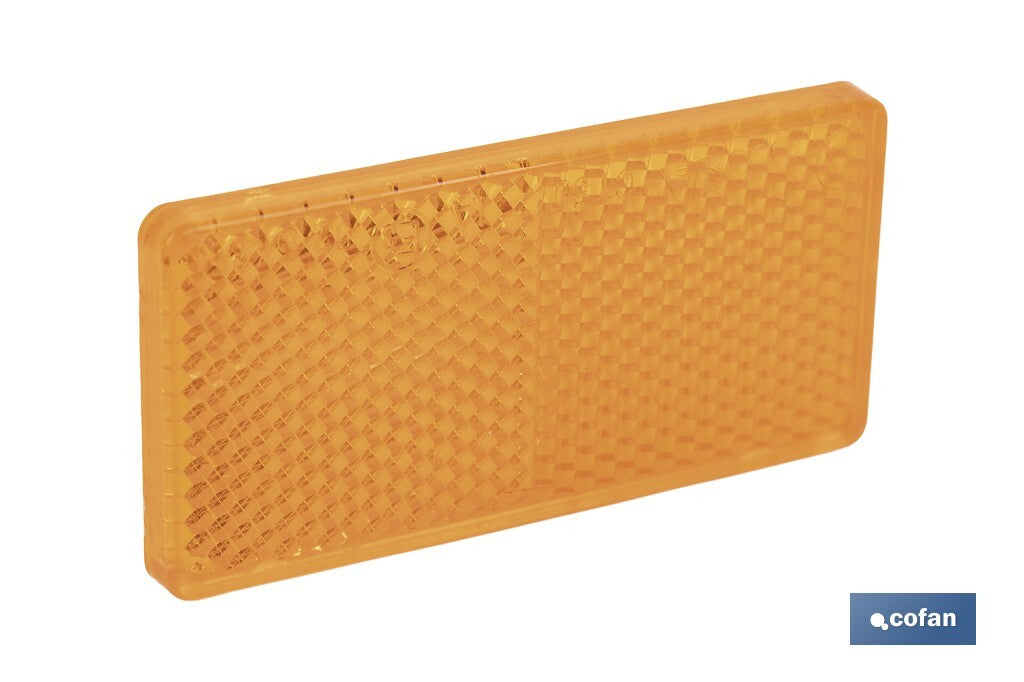 CATADIÓPTRICO RECTANGULAR ÁMBAR 71 X 35 MM CON ADHESIVO