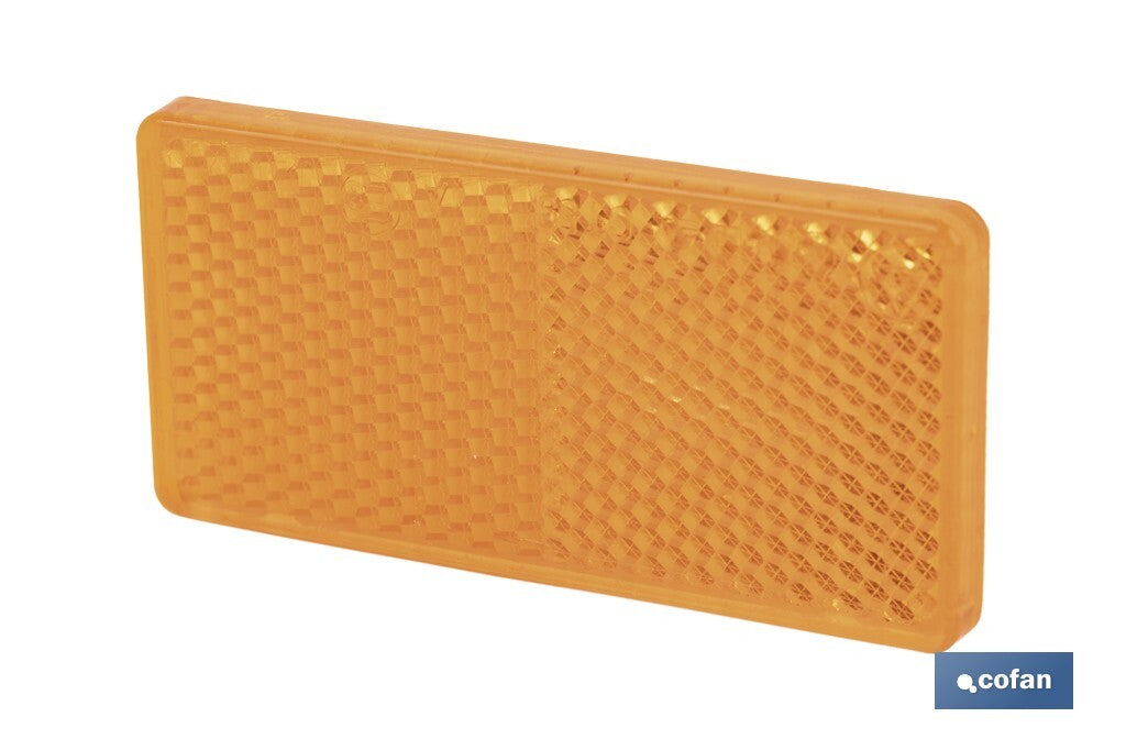 CATADIÓPTRICO RECTANGULAR ÁMBAR 71 X 35 MM CON ADHESIVO