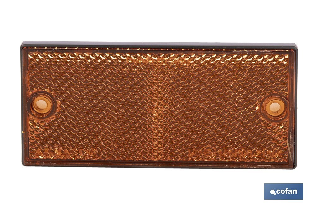 CATADIÓPTRICO RECTANGULAR ÁMBAR 106 X 50 MM CON AGUJERO SIN TORNILLO CON ADHESIVO